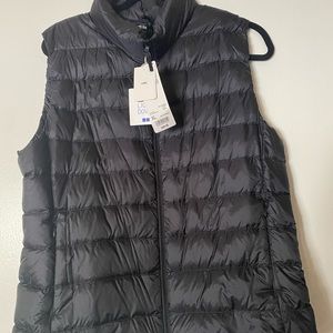 Black puffy vest jacket